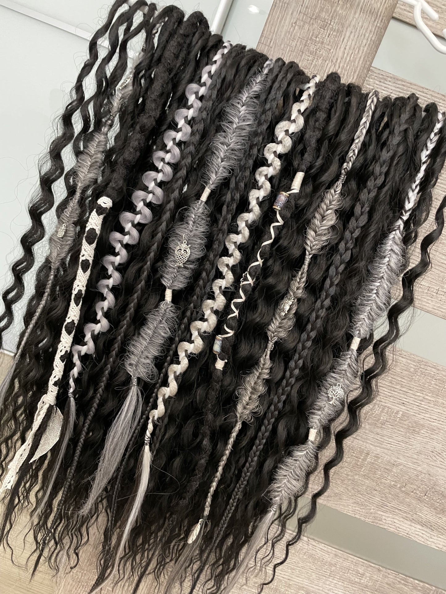 black bohemian synthetic dreadlocks and dark gray textured braids